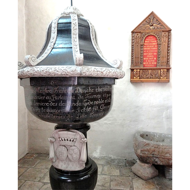 the early-18thC font on the left, the medieval quadrangular basin on the right