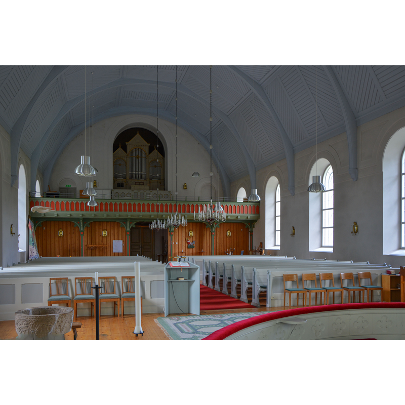 Source caption: " Furuby kyrka. Interiör mot norr." -- partially showing the the medieval font in the bottom left corner of the image
