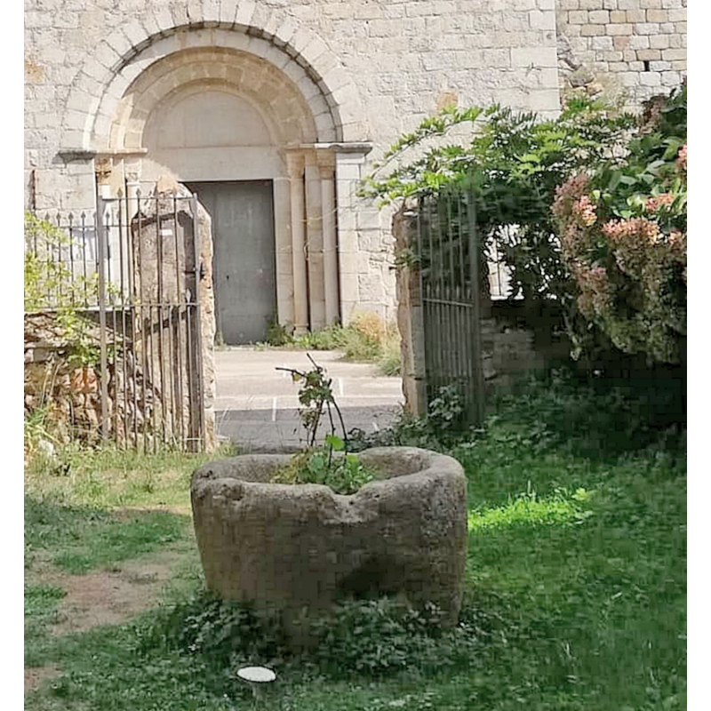 the tub vessel seen here, in front of the west portal of the church, may be the discarded medieval font of the monastery church