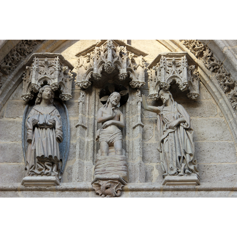 Source caption: "Catedral de Sevilla. Tímpano de la portada del Bautismo."