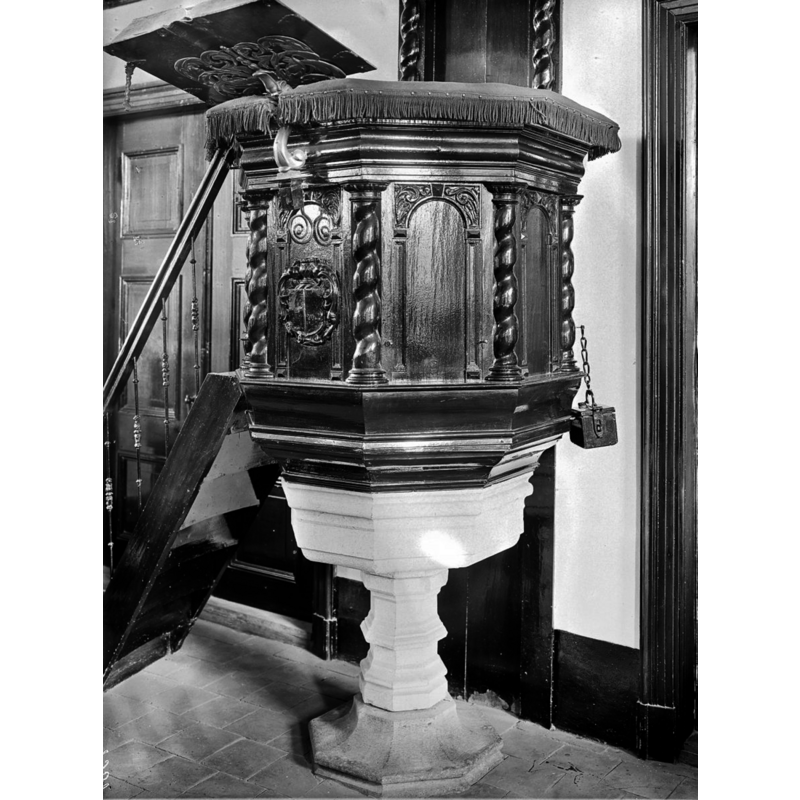 showing the stone baptismal font being used as base for the pulpit until the 1971 renovation of the church