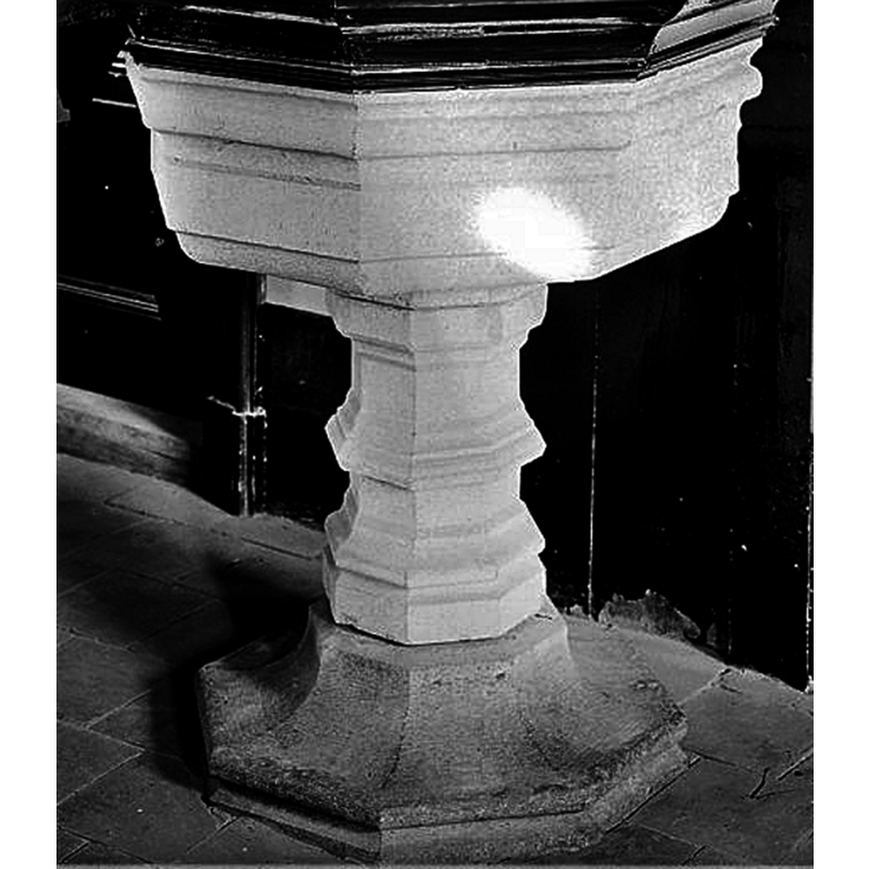 showing the stone baptismal font being used as base for the pulpit until the 1971 renovation of the church