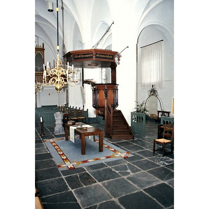 showing the stone font already detached from the bottom of the pulpit