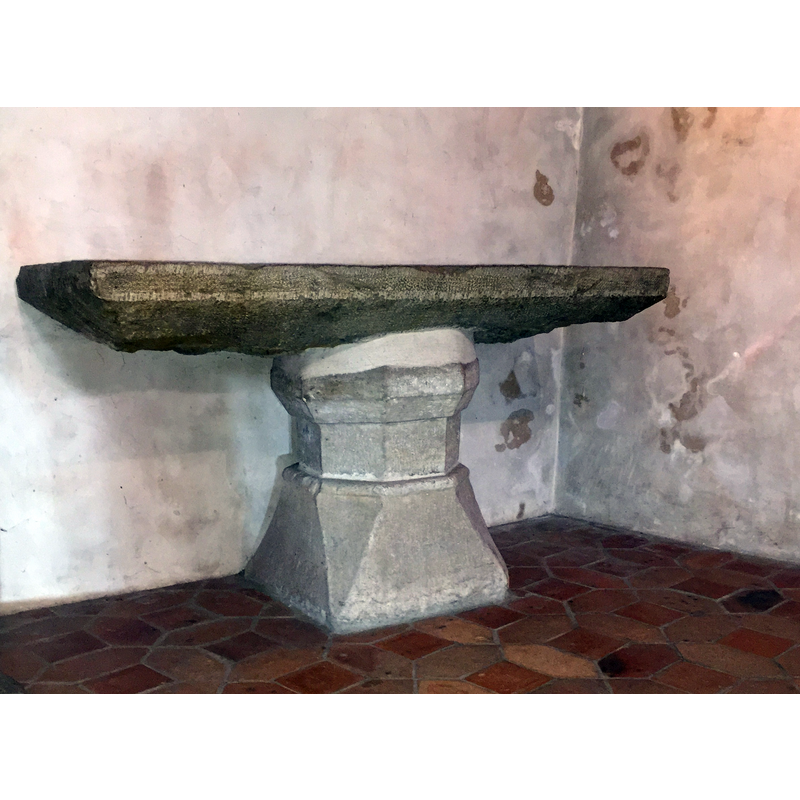 though set up as altar now, the composite object looks much like a tombstone lid cemented to a baptismal font base [cf. FontNotes]