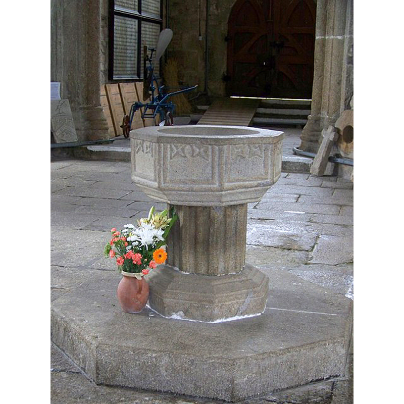 Source caption: "Font, St Pancras Church, Widecombe-in-the-Moor. The church has an ancient font, octagonal in shape."