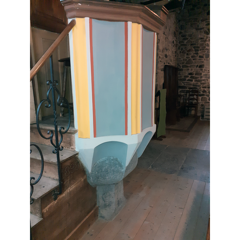 mounted on an ancient baptismal font