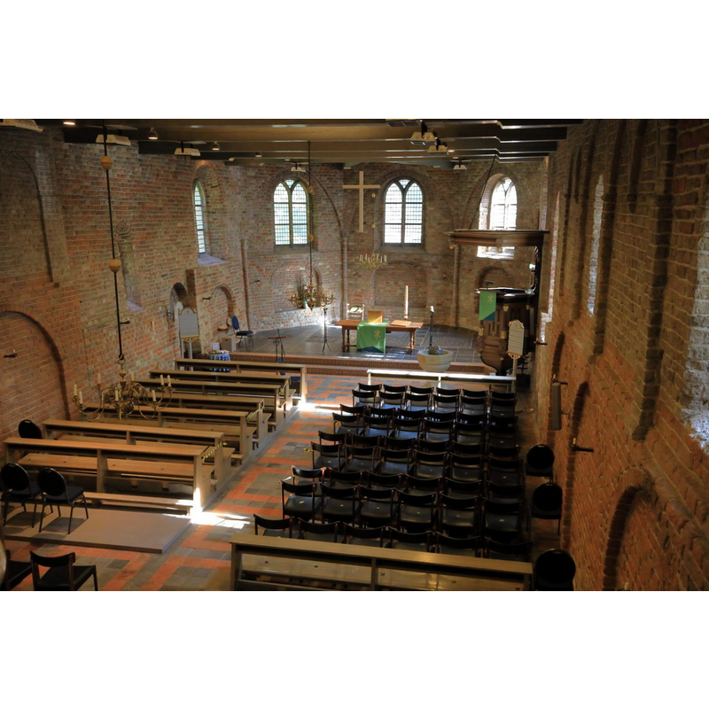 the restored medieval font is visible here at the far [east] end, by the foot of the pulpit