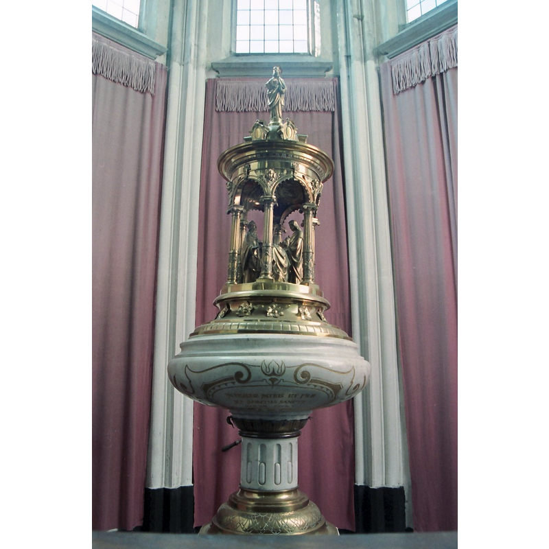 the later font of 1876, an anniversary gift of pastor-dean Van de Ven, made by M. Bertou of Antwerp [inscribed on the underbowl]