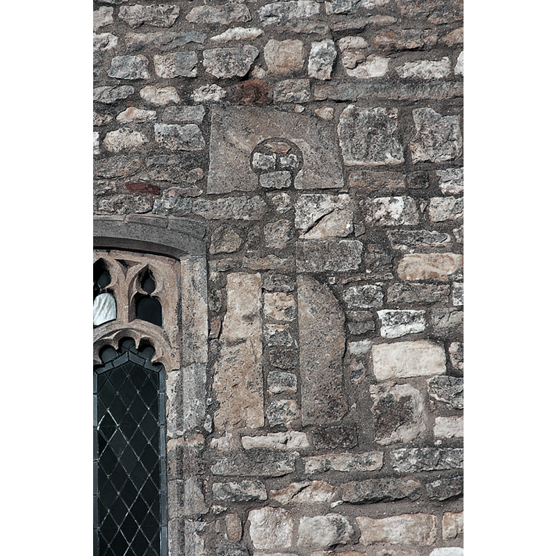 Source caption: "Anglo-Saxon window. Blocked 11th century keyhole window in the south wall of All Saints' church"