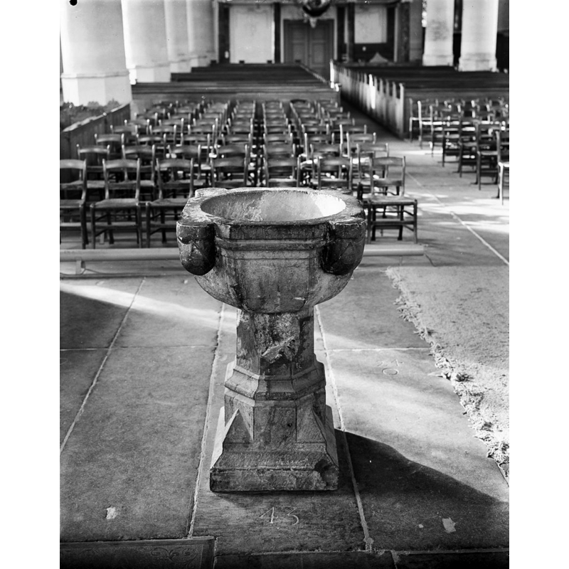 the Kuinre font inside the Bolsward parish church -- notice the damaged area on the upper half of the stem