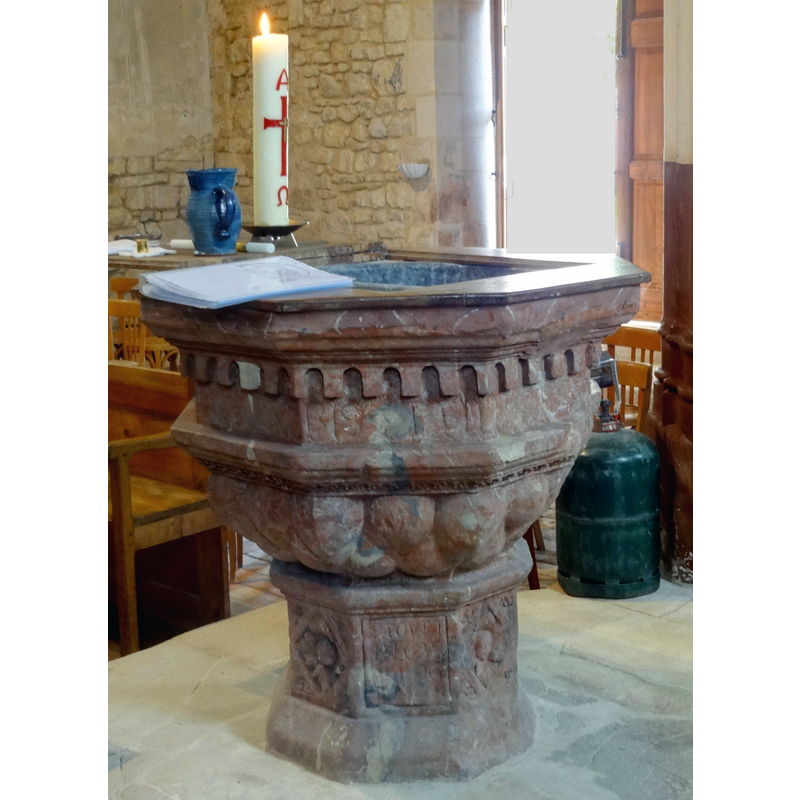 visible here inside one of the panels of the pedestal base