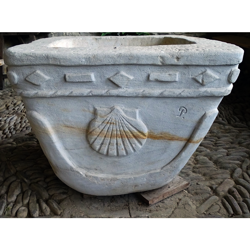 the newly re-carved font, still in the porch in 2021