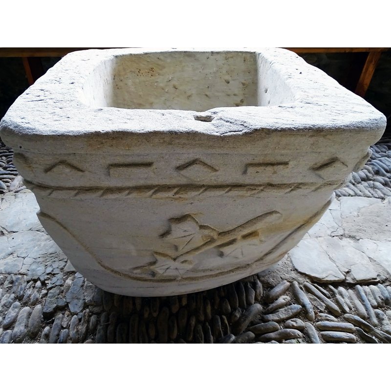 the newly re-carved font, still in the porch in 2021