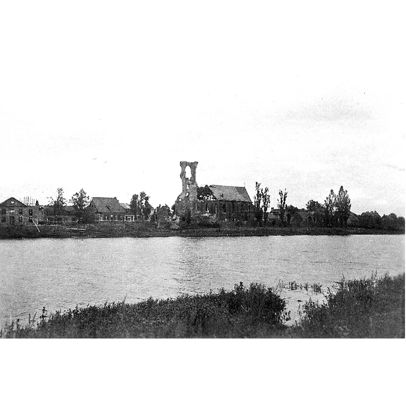 the old church, seen here across the river Maas, had been severely damaged by Allied fire bombings in 1944 and would eventually be demolished in 1956