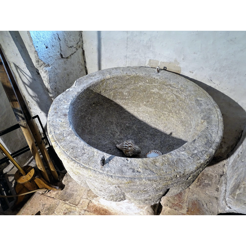is there a drain hole hidden by the shells?