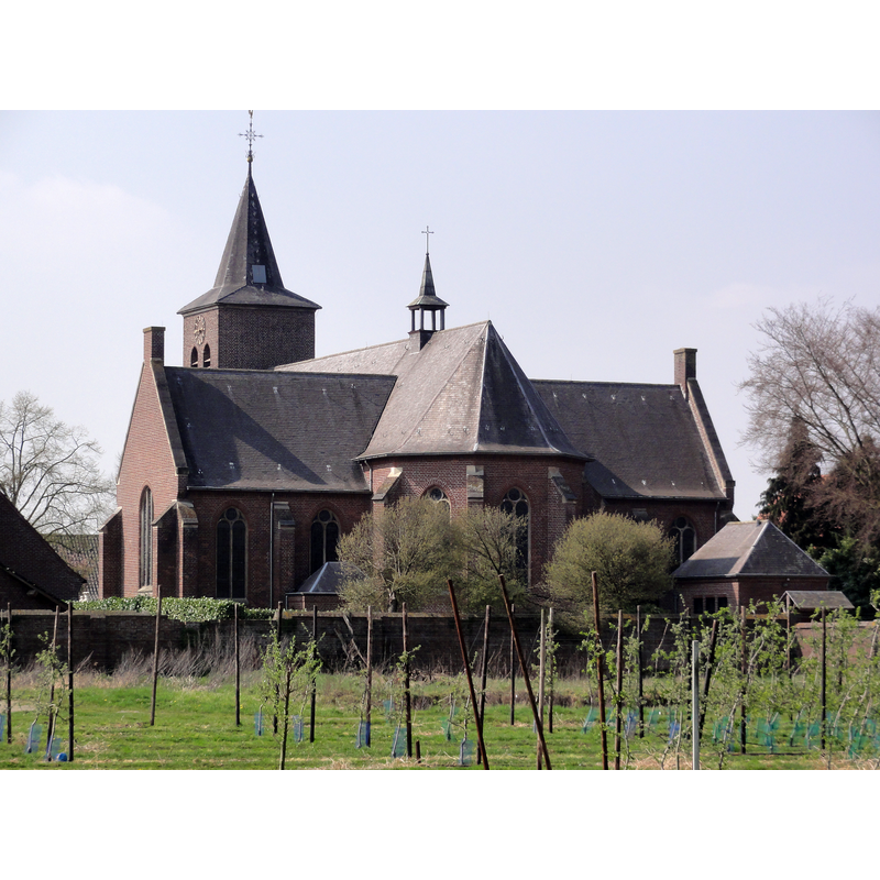 Source caption: "Blitterswijck, O.L.V. Geboortekerk achteraanzicht" -- the fully restored church