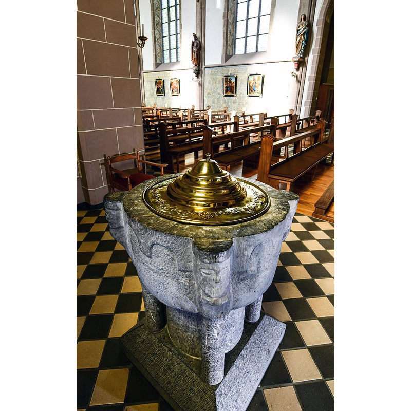 the 13thC basin . the modern base and the 17thC font cover