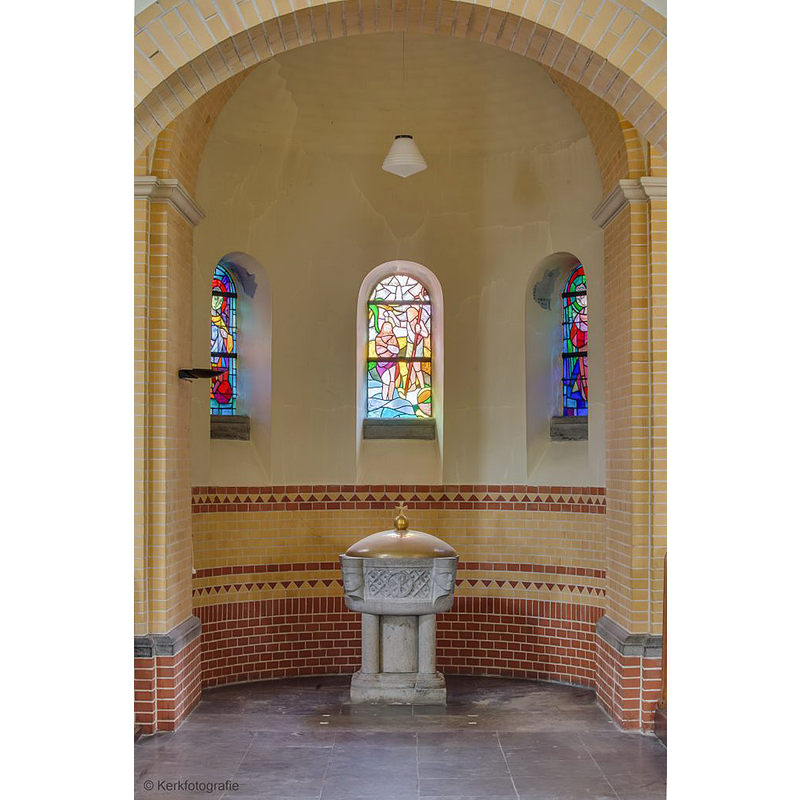 containing the 1885 baptismal font