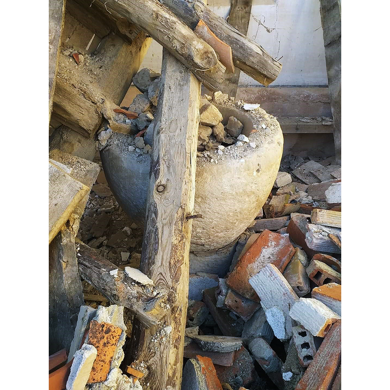 the church in February 2022 -- covered in debris at the west end of the nave