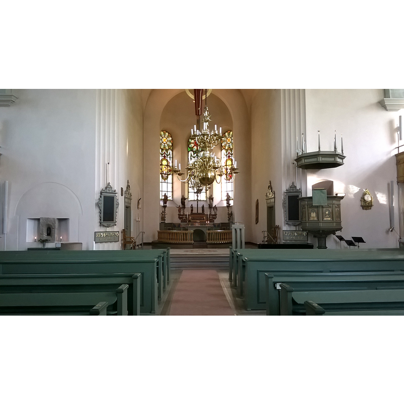 Source caption: "Gränna kyrka, Sverige 2 juli 2015" -- the top of the font is visible on the north side, to the left of the psalm board
