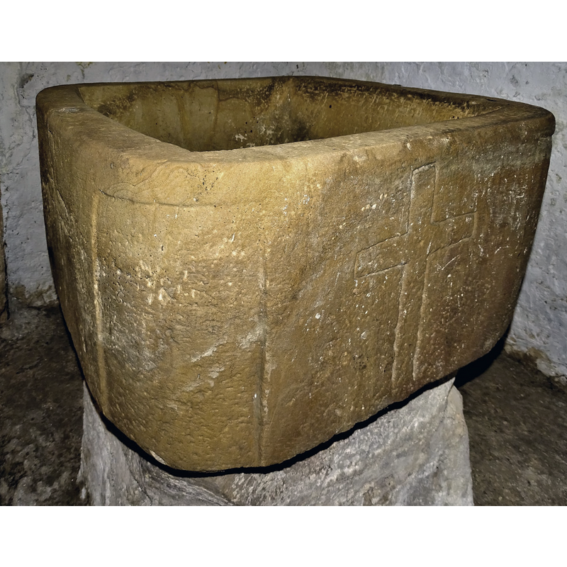 a Latin cross incised on each side of the basin [cf. FontNotes]
