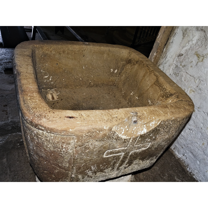 one of the metal staples is discernible here; it caused the stone to split