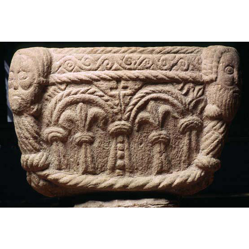 the arched and columns of the arcade vary per side; here, for instance, the upper arch is roped while the lower is plain, on the side of the seated figure holding a sword the order of the arches is reversed, the lower arch is rope patterned while the upper arch is plain