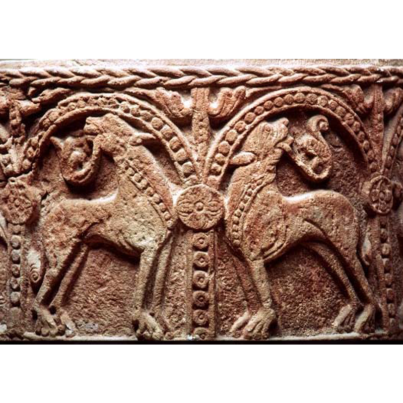 Source caption: "motställda fyrfotingar" -- the one on the left, passant to the right; a band of beaded tape across the neck may perhaps be a stylised depicting of a lion's mane