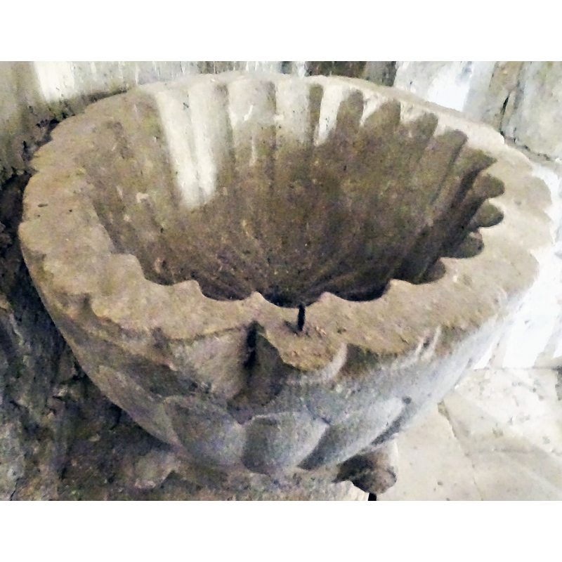 showing the damage to the upper rim from an earlier metal anchor; a new one was added next to it