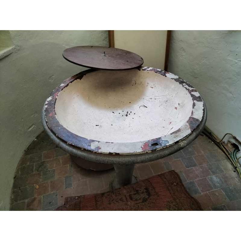 the disused 17thC font inside the disused baptistery