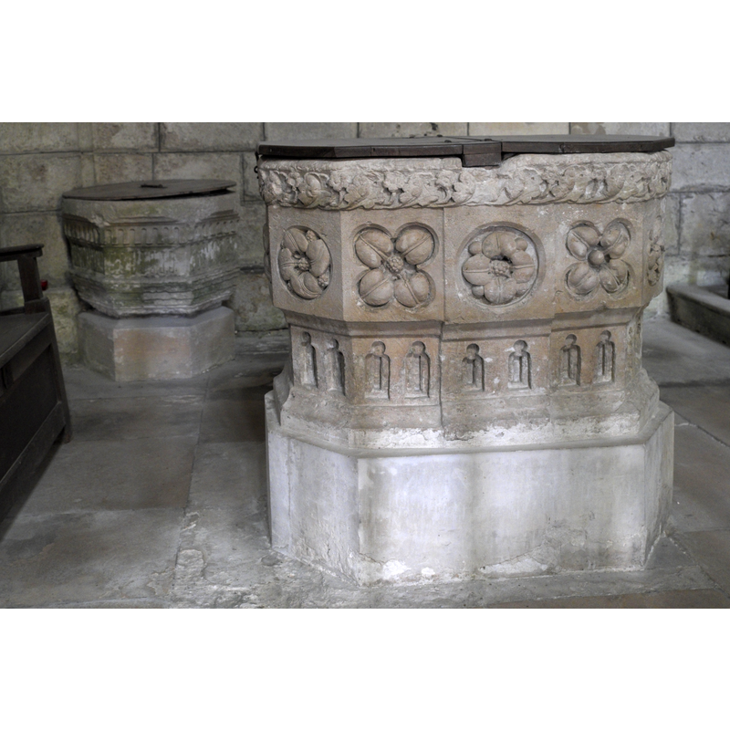 the font in the foreground is the 17thC font; the font at the back is the 13th-century font