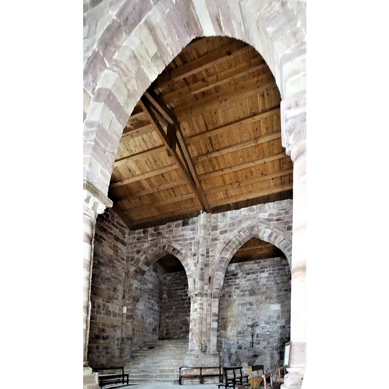 the font is inside the right arch