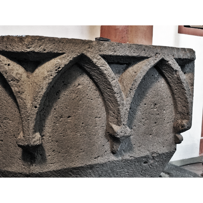 a pair on each of the panels of tee octagonal basin