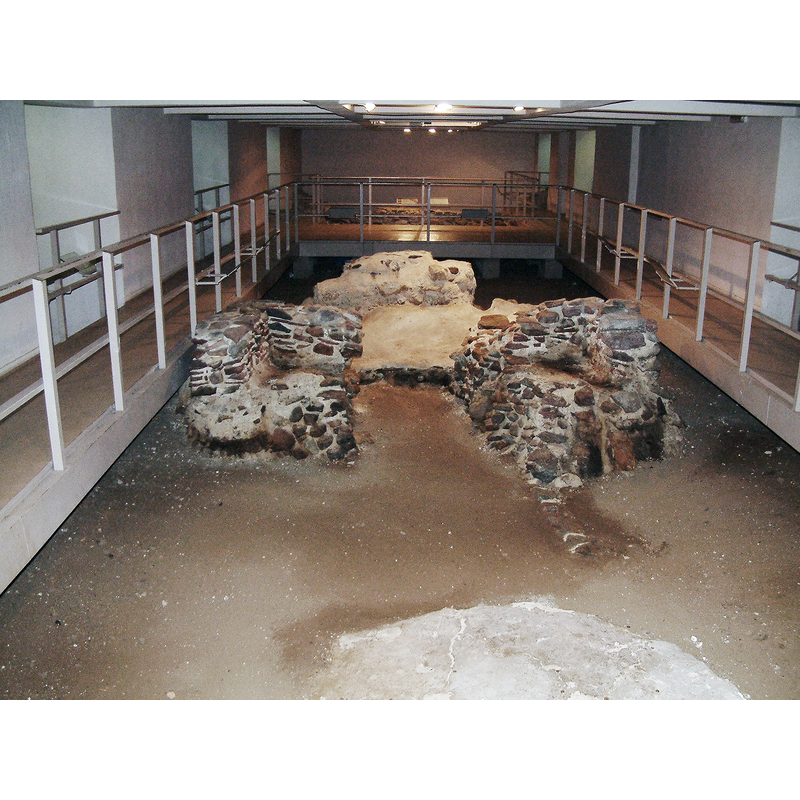 Source caption: "Underground of Poznań Archcathedral Basilica of St. Peter and St. Paul, remanents of preromanesque cathedral" [NB: in the crypt; the lighter shape in the foreground is part of the claimed lime-mortar 10thC font]