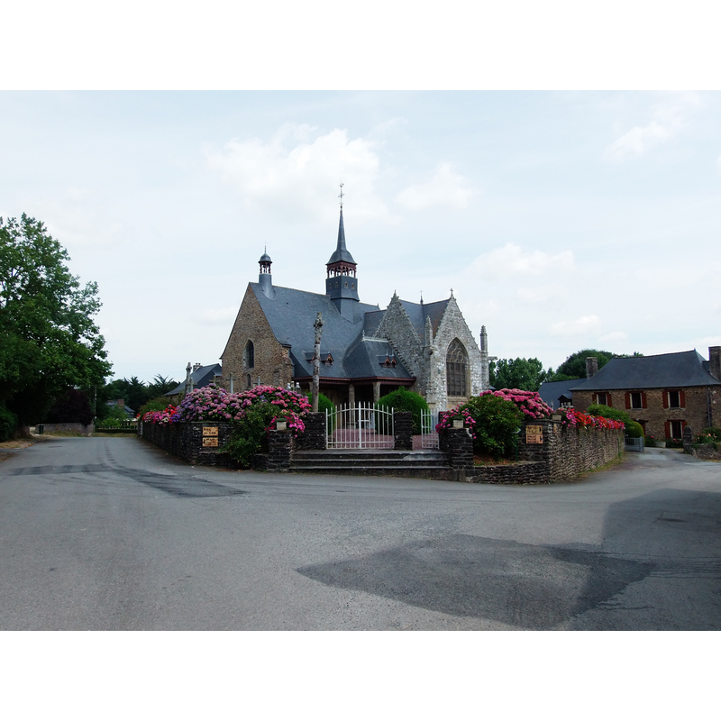 Source caption: " Vue large de l'Église et du cimetière."