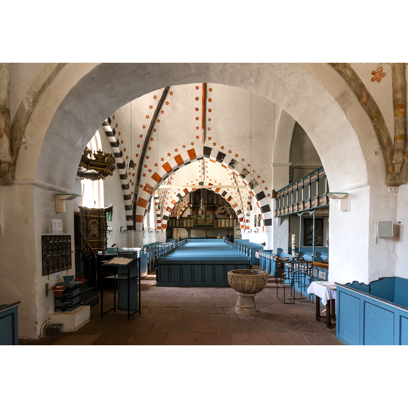 Source caption: "13th-century Romanesque church building with gothic and baroque extensions"