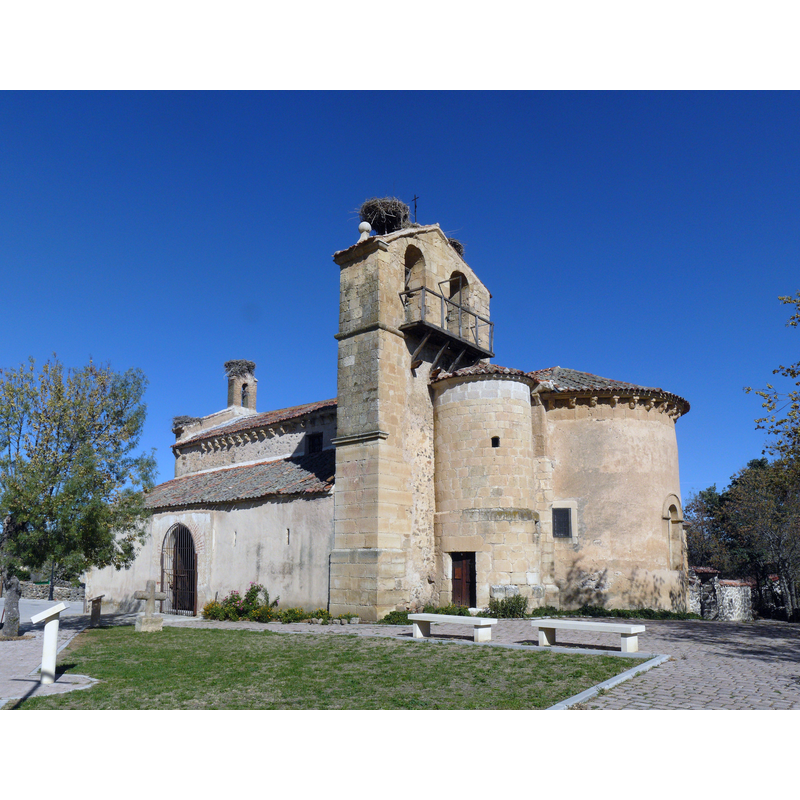Source caption" " Vista de la iglesia románica de Pelayos del Arroyo, Segovia." -- obviously a very popular church among nesting-builder cranes!