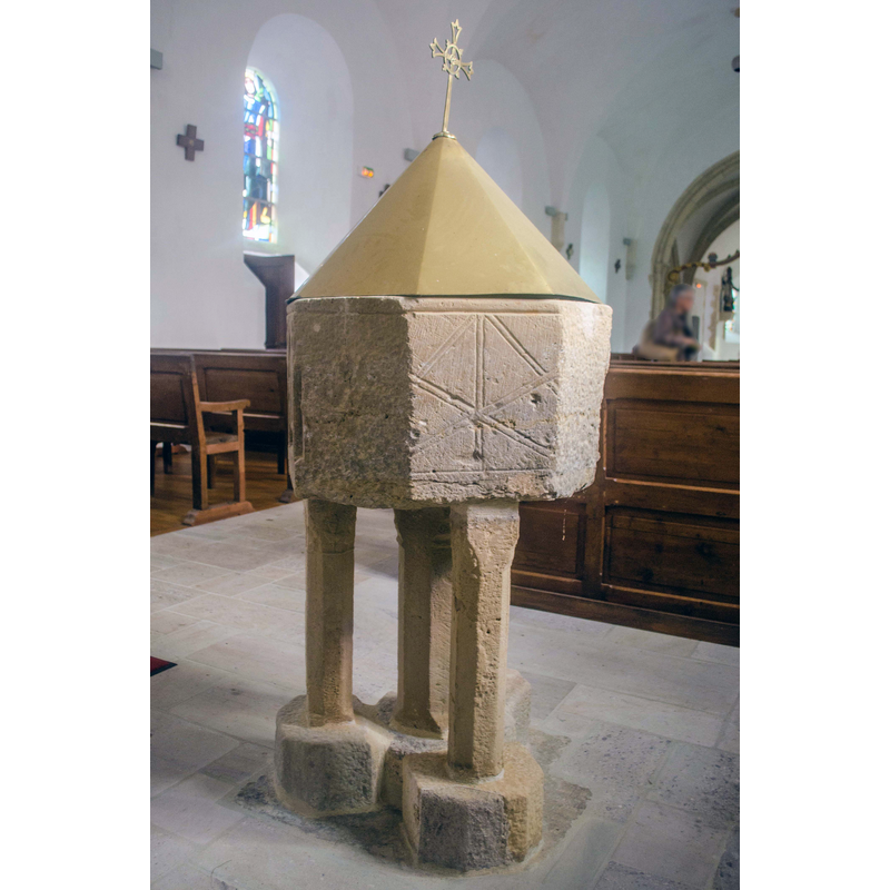 Source caption: "Omonville-la-Petite, Manche, France. Église Saint-Martin, fonts baptismaux"