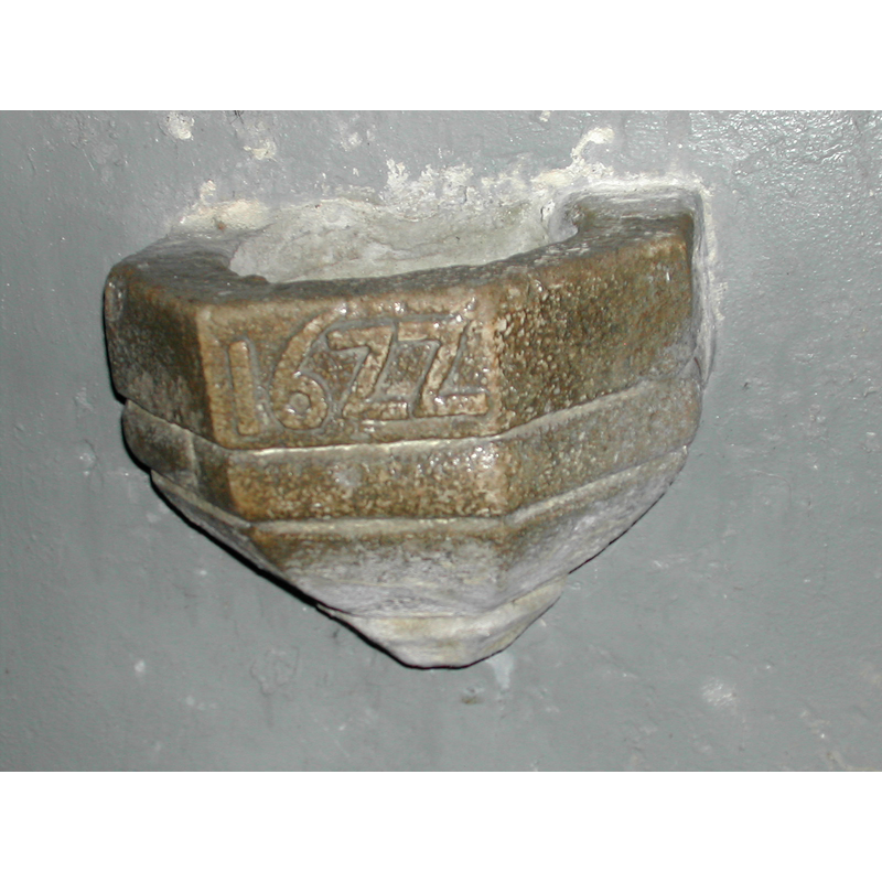 one of the two early-17thC wall-mounted stoups [cf. FontNotes]
