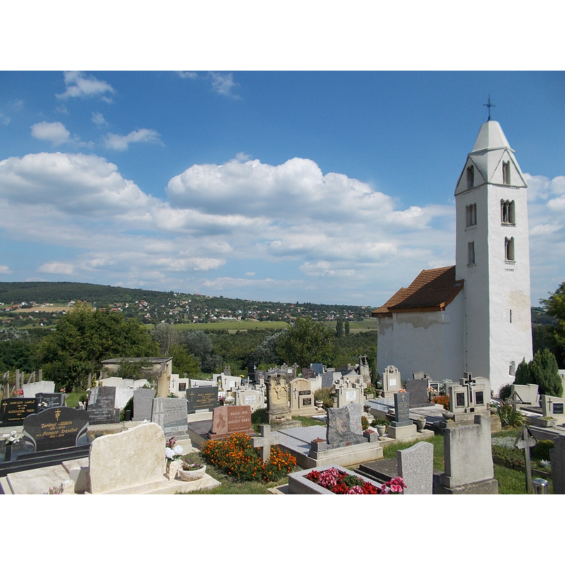 Source caption: "Mary Magdalene Church. The Árpád-age church is one of the three intact Árpád-era churches in the Balaton Uplands, it is also mentioned as Hévíz's pearl. The church was built in the 13th century. The first mentioned in written records in 1314. View to Battyán-hát, the most wester part of the Balaton Upland National Park. - Dombföldi St., Egregy, Hévíz, Zala County, Hungary."