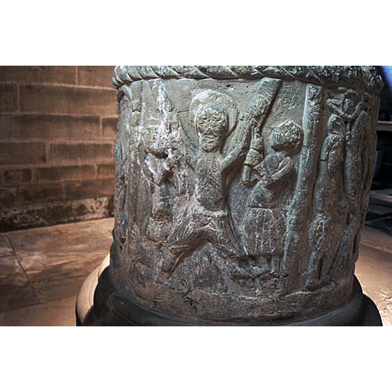 Source caption: "The Norman font is kept in the south west corner of the church and has pride of place"