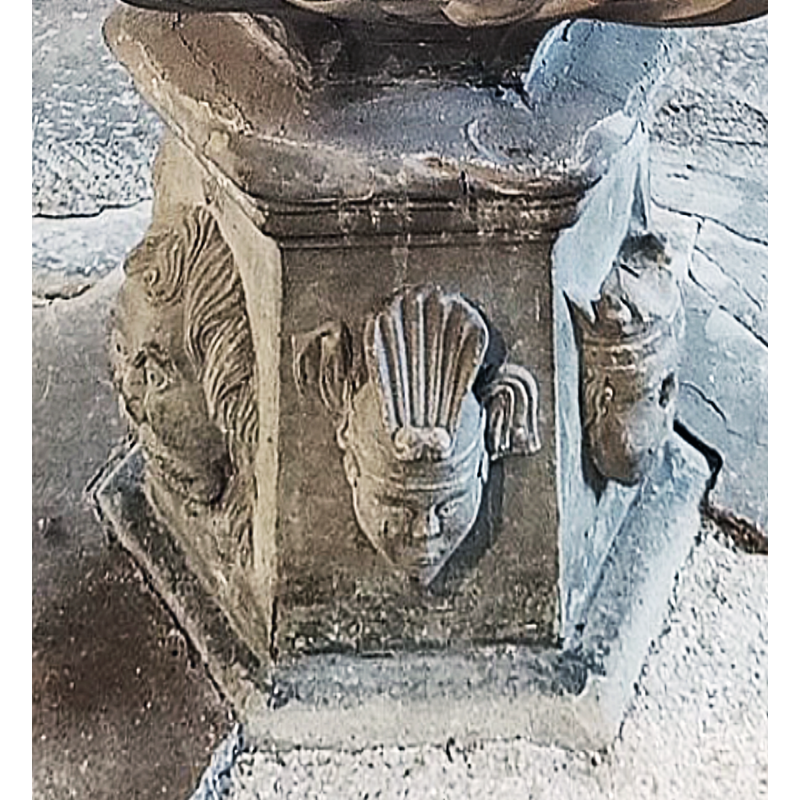 three seen here: a lion's on the left; centre and right are human heads wearing headgear of some sort [NB: one side is blank now but originaly had a head on it as well]