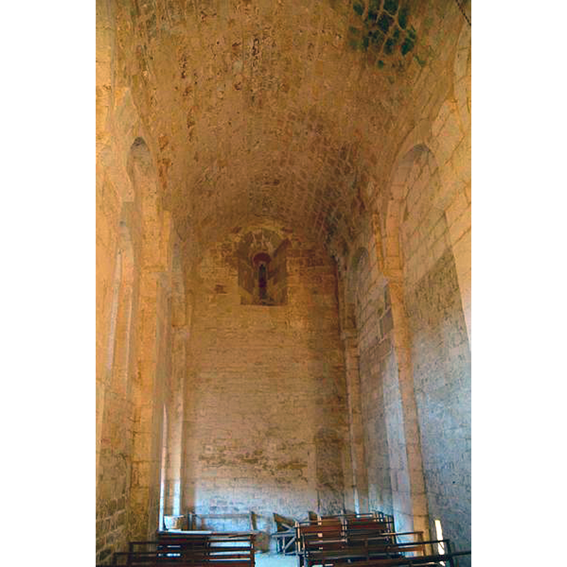 Source caption: "vue générale de la nef" -- the stoup is partially visible by the south entranceway, in the bottom-left corner of the image