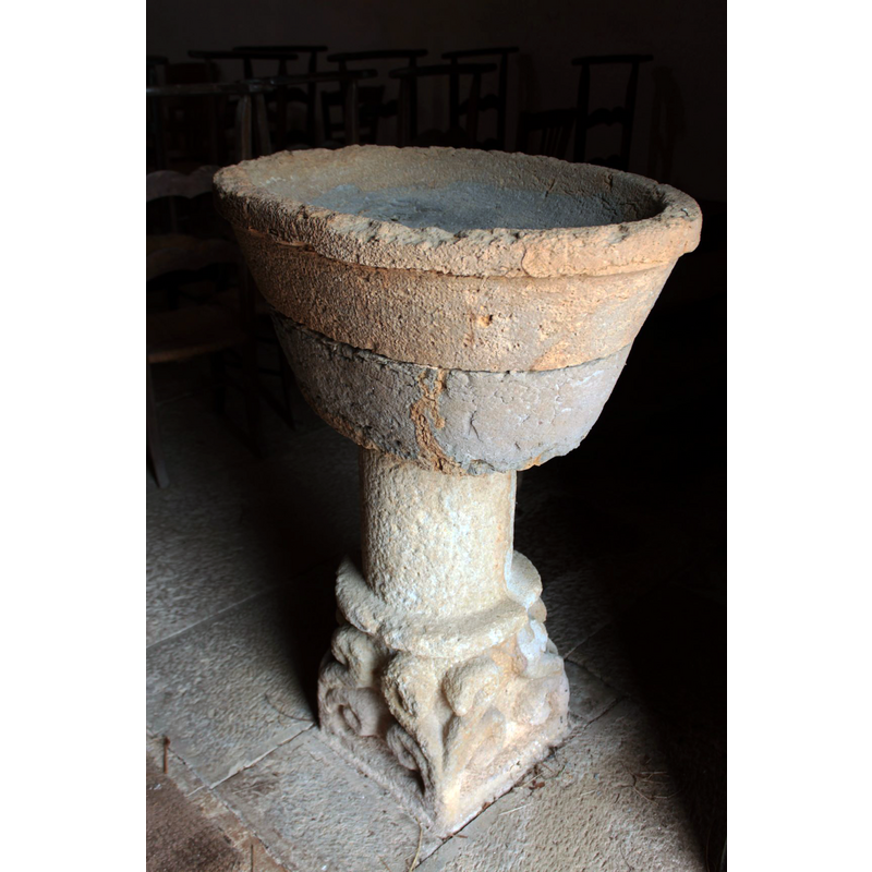 part of the medieval capital re-used as lower base of the composite stoup