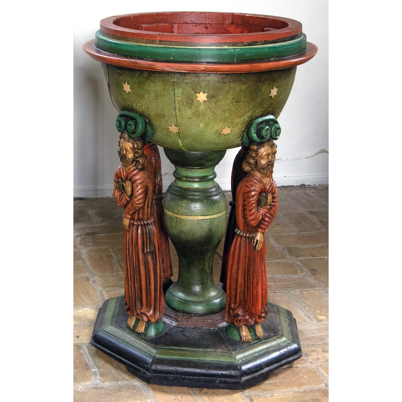 on the central baluster-shaped shaft