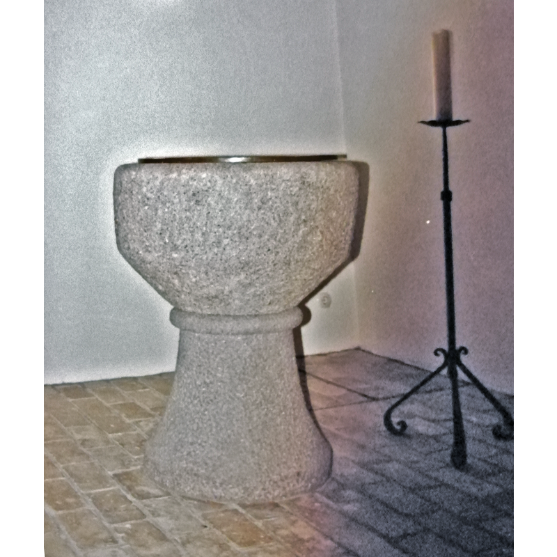 the only decorative element on this medieval font is on the base, itself a modern replacement