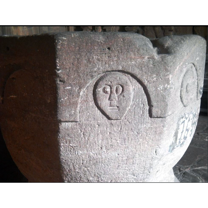 in one of the arch-heads