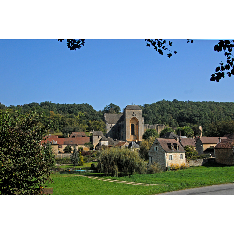 Source caption: "Saint-Amand-de-Coly, Dorf und Abtei"