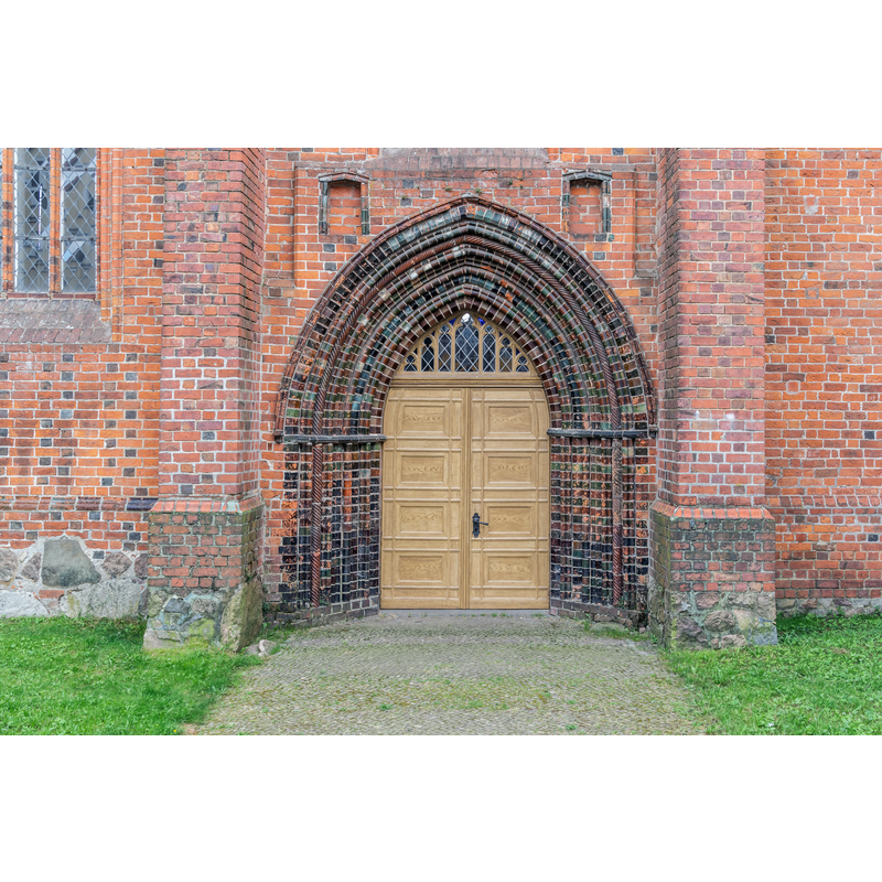 Source caption: "Side portal of the Saints Mary and Martin church in Wittstock/Dosse, Brandenburg, Germany "