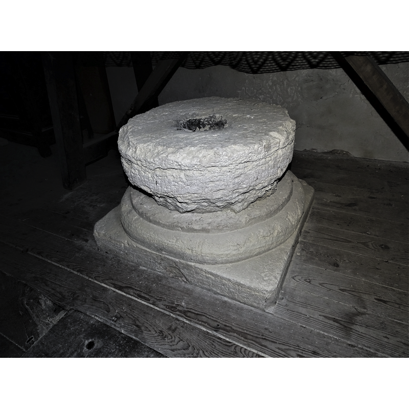 [NB: the purported original base is a composite of two parts: the upper block is roughly cylindrical and extremely damaged and eroded, while the lower part, moulded round top and plain square bottom, appears well preserved] [cf. FontNotes]